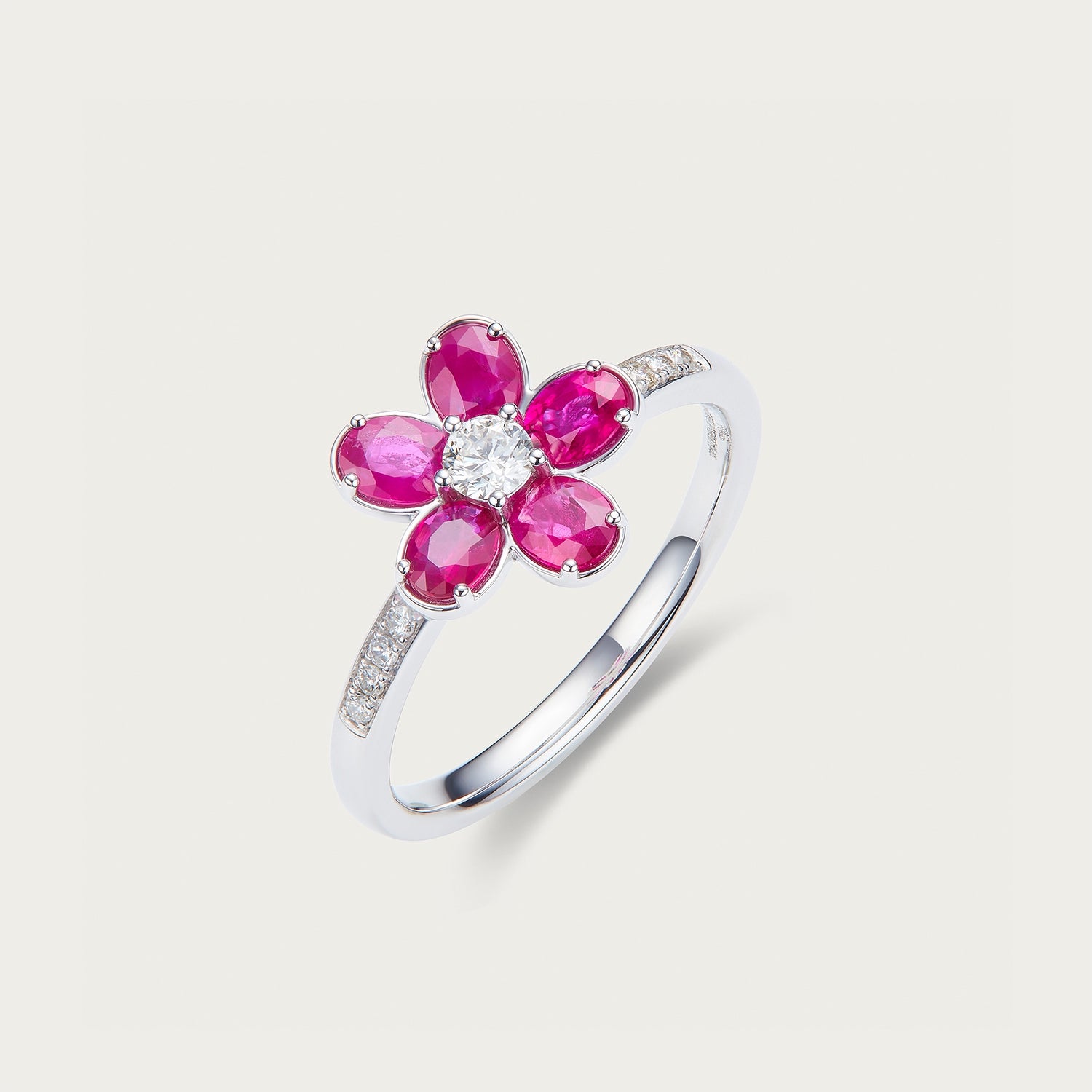 Detail of ruby center stone in Pure Bloom flower ring