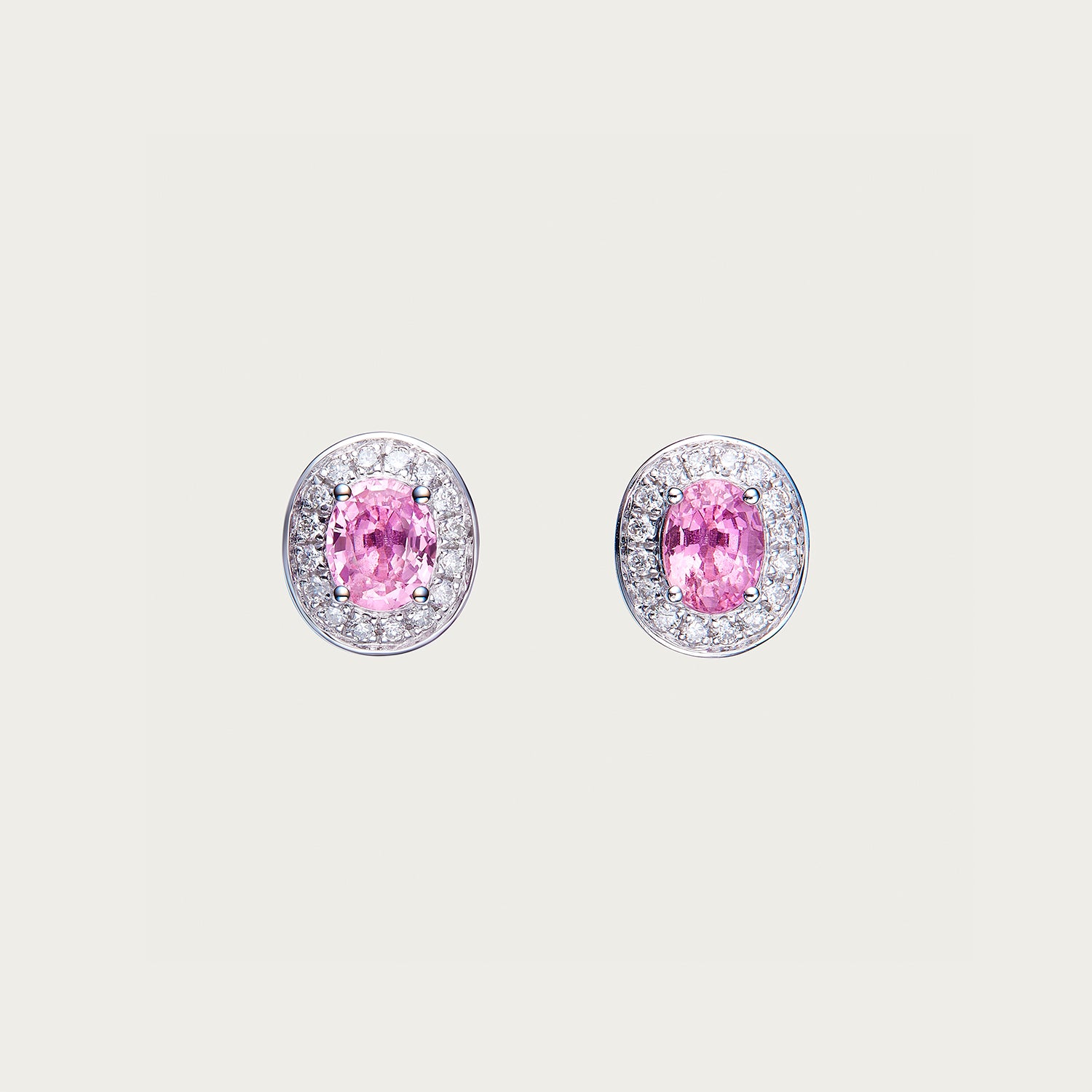 Aura Field earrings with Padparadscha pink sapphire and diamond halo in 18K white gold