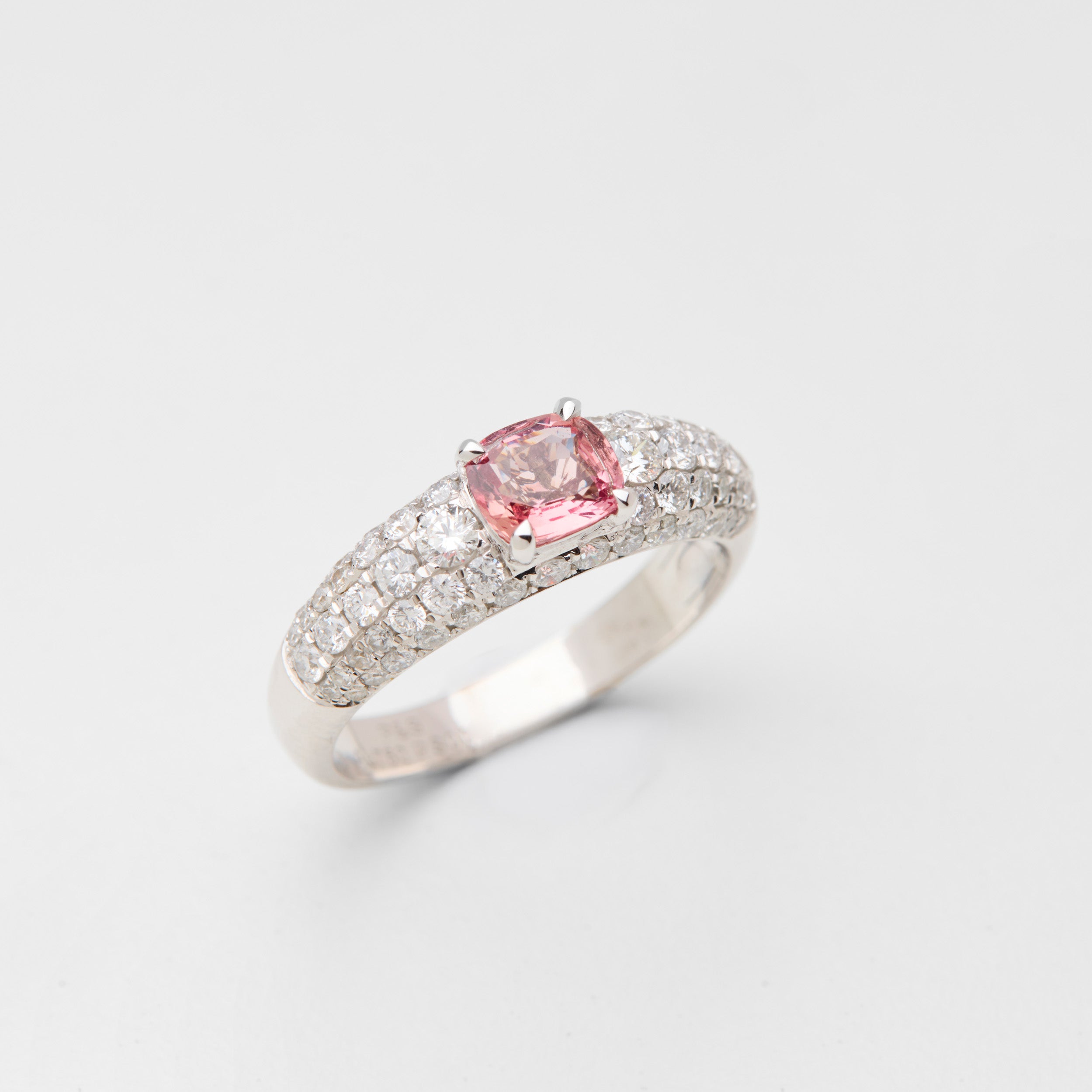 Side detail of Padparadscha sapphire in Galaxy Light ring