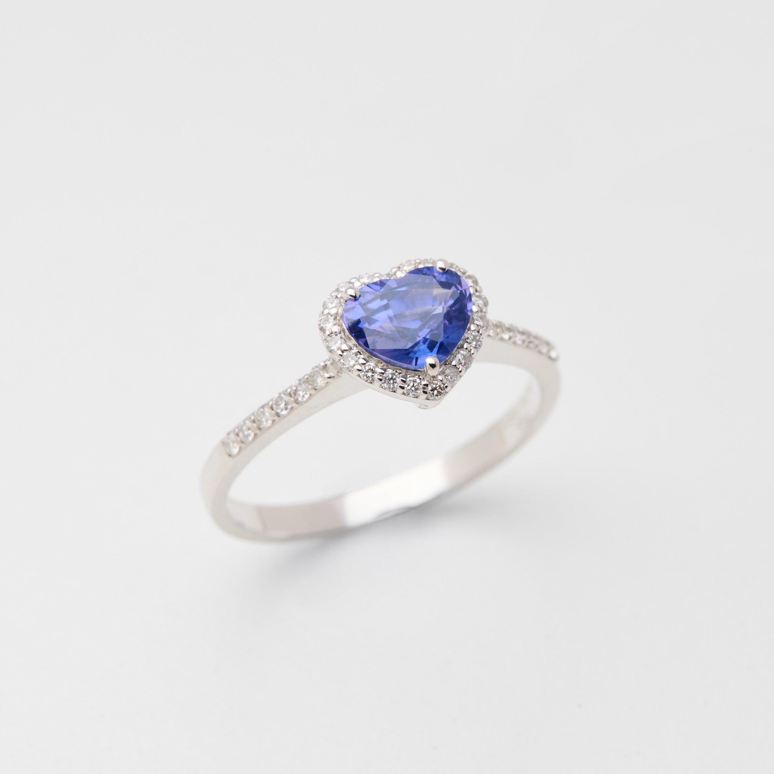 Close-up of heart-shaped purple sapphire in Rainbow Heart ring