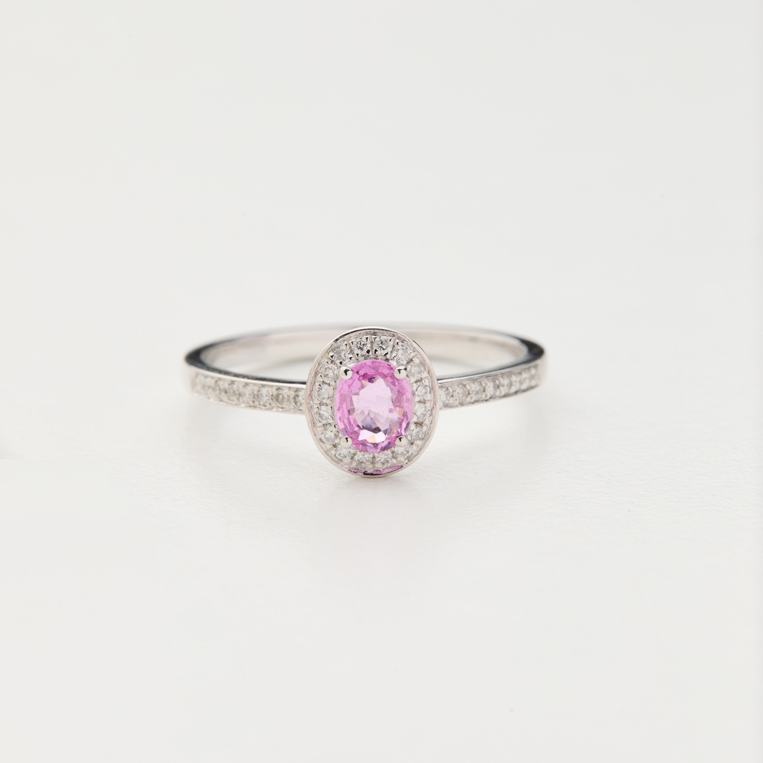Aura Field ring with Padparadscha pink sapphire and diamond halo in 18K white gold
