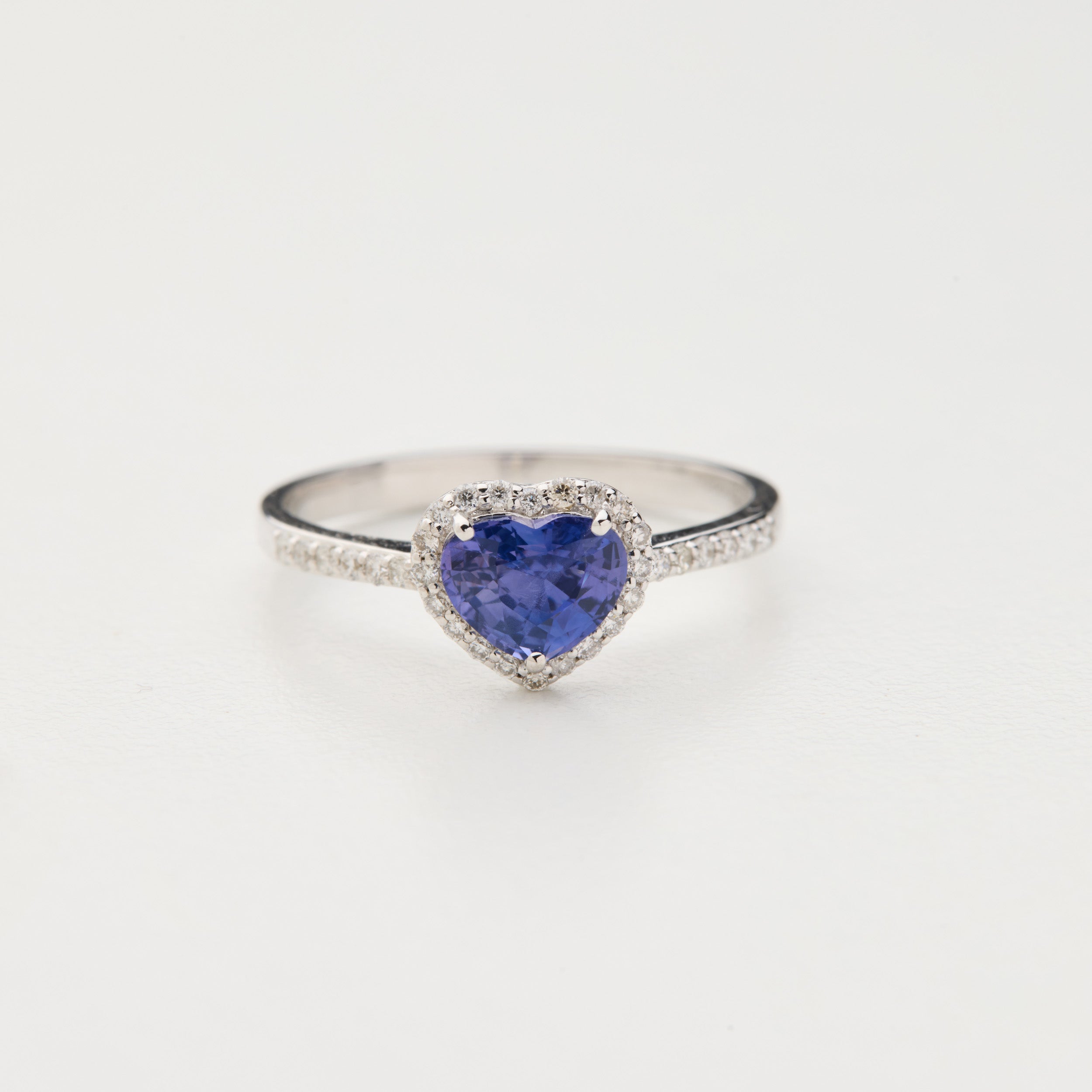 Rainbow Heart ring with heart-shaped unheated purple sapphire and diamond halo