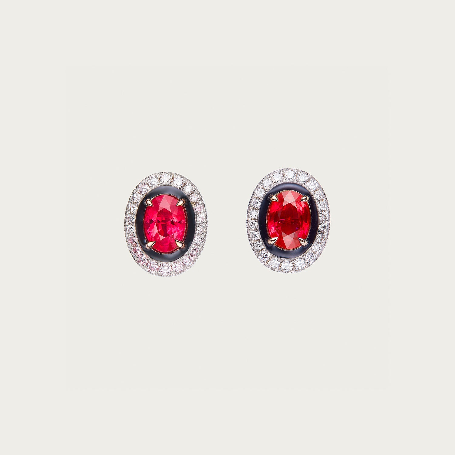 Galaxy Orbit earrings with Burmese ruby center stones and diamond halos